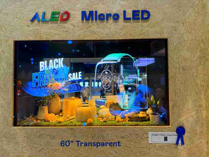 赏金国际60吋高透明度Micro LED显示器获”最佳Micro LED技术应用奖”，，，将Micro LED面板透明化之设计特性极致发挥，，，，以可扩展性无缝拼接技术打造，，具备600 nits全画面亮度、、、大于60%穿透率及超过NTSC 110%的优异广色域表现，，，可依需求灵活应用于各种场域